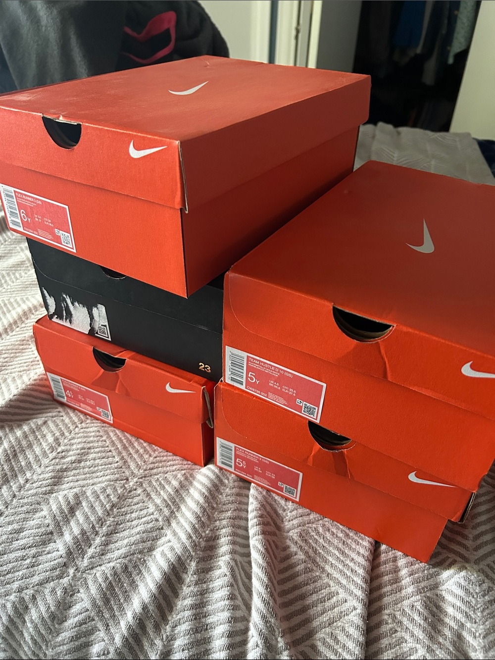 Nike Orange and Black Shoe Box Stack